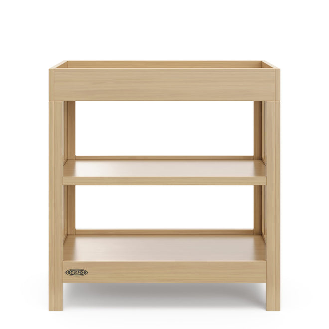 Graco Teddi Changing Table with Water-Resistant Changing Pad (Driftwood) - GREENGUARD Gold Certified, 2 Open Shelves, Includes Bonus Water-Resistant Changing Pad with Safety Strap 🍁 All In One Marketplace Canada