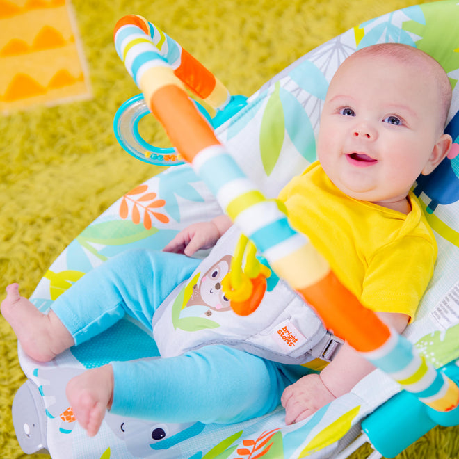 Bright Starts Rainforest Vibes 3-Point Harness Vibrating Baby Bouncer with -Toy bar 🍁 All In One Marketplace Canada